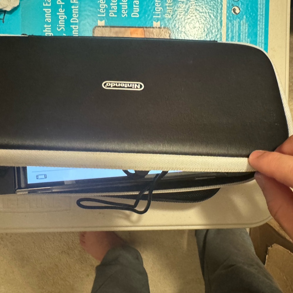 Nintendo Switch with Black and White Protective Case